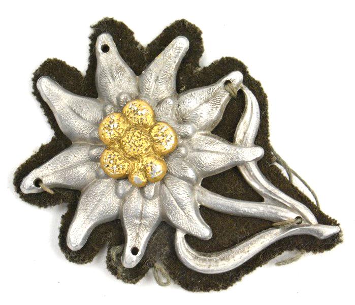 German WH Edelweiss Cap badge with backing